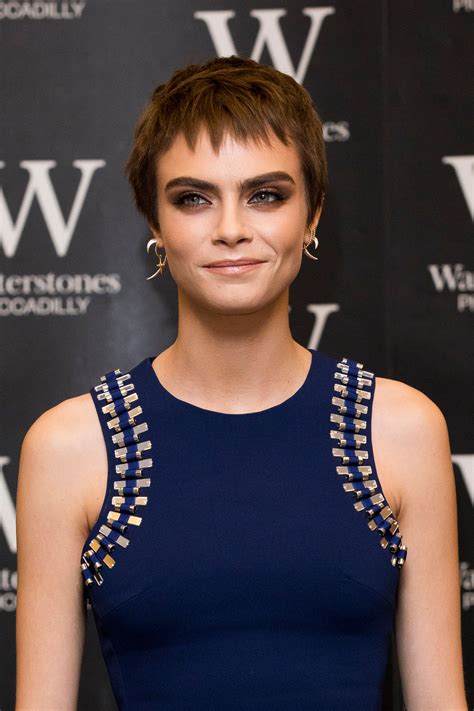 She lost her hair during chemo. Cara Delevingne Dyes Her Short Hair Brunette | Teen Vogue