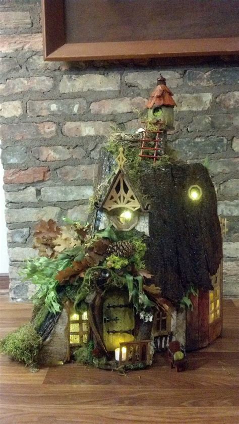 You can also make the house using leftover popsicle sticks and some glue. Fairy+House+Hollow+Stump+from+100+year+old+tree+by ...