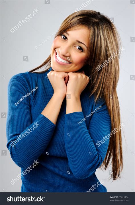 Pretty Eurasian Or Mixed Race Woman Smiles In Content Happy With