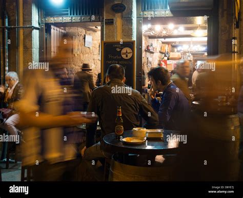 Young People Drinking Outside Bar Stock Photo Alamy
