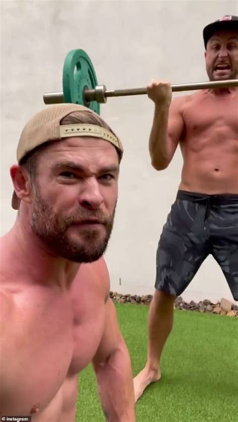 Shirtless Chris Hemsworth Shows Off His Impressive Physique During A
