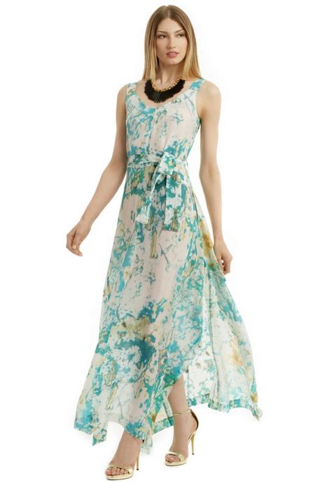 This floral sheath dress is a stunning option for warmer weather weddings and can easily be worn with casual sandals or dressy heels. Mother of the bride dresses for outdoor wedding