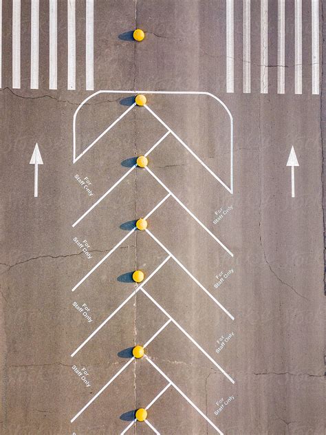 Aerial View Of Empty Parking Lots With Painted Lines By Stocksy Contributor Yaroslav