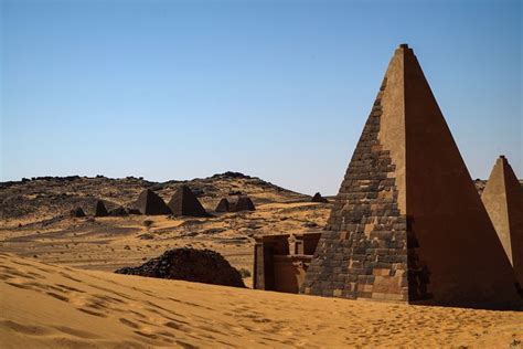 Some Very Tall Pyramids In The Desert