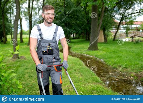 Handsome Man Dressed In Lawn Mowing Outfit Stock Image Image Of House