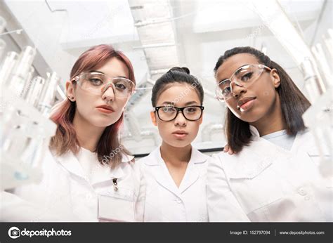 Scientists Group In Laboratory — Stock Photo © Dmitrypoch 152797094