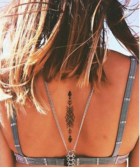 11 Small Simple Back Tattoos For Girls Tattoos Spine Tattoos Simple