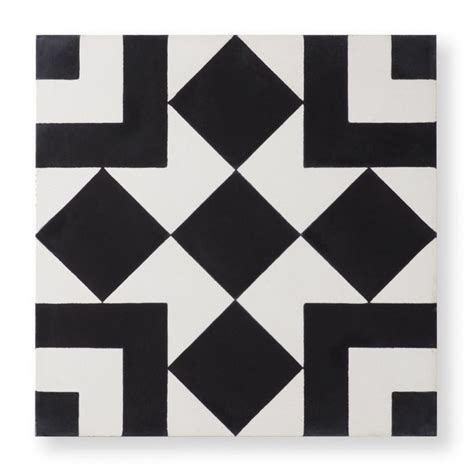 A Black And White Tile With Squares And Rectangles In The Middle On A