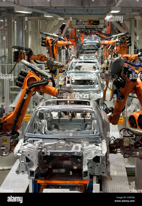 Industrial Robots Putting Out Car Bodies On Assembly Line 2 Audi A4