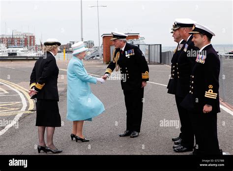 Queen Elizabeth Ii Is Greeted By Commodore Jeremy Rigby The Naval Base