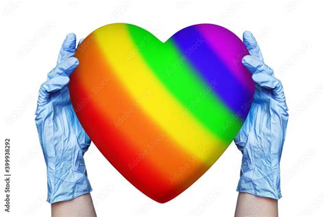 Doctor Hands In Medical Gloves Hold Heart Lgbt Community Rainbow Flag