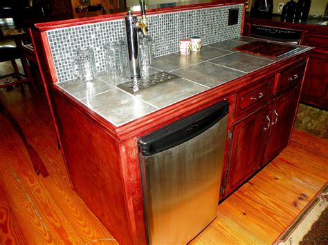 It will also be a lot cheaper in the longer term than buying bottled beer in the supermarkets and it is a great way to impress your friends when they visit. Island Kegerator | Kegerator bar, Kegerator, Home