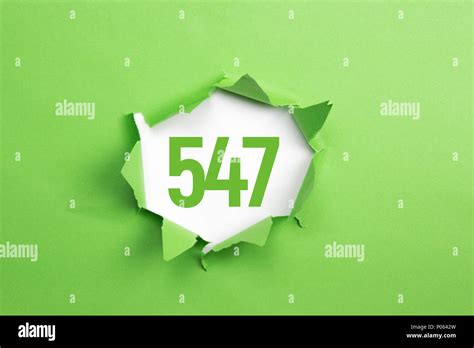 Green Number 547 On Green Paper Background Stock Photo Alamy