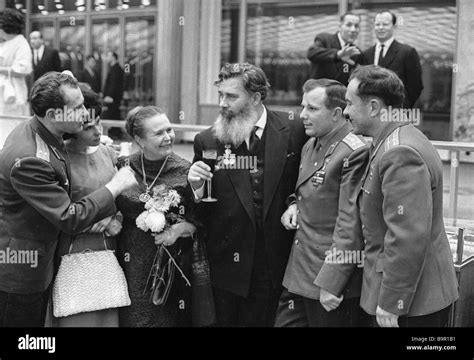 space pilots yuri gagarin second right pavel popovich right gherman titov left and his wife