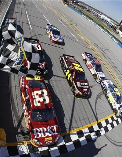 Dressed in a navy coat with a gold crest, a resting lebron james sported a good look. NASCAR: Jimmie Johnson's Photo Finish Win At Talladega ...