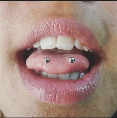 Snake Eyes Piercing On Top Of Tongue Snake Poin