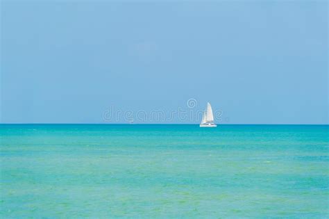 Blue Turquoise Seawater In Summer Season During Travel Holidays
