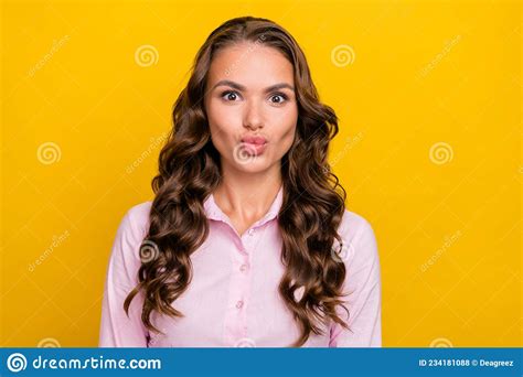 Photo Of Flirty Young Brunette Lady Blow Kiss Wear Pink Shirt Isolated On Yellow Color