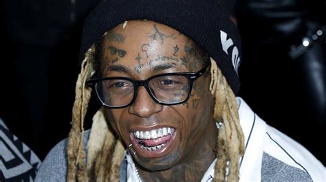 He was previously married to toya johnson. The meaning behind Lil Wayne's TNT face tattoo