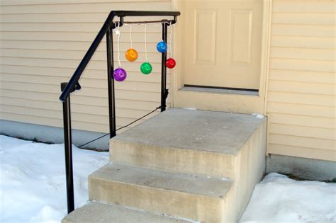Outdoor metal stair railing systems with balusters and decorative ornaments. 5 DIY Metal Stair Railing Examples