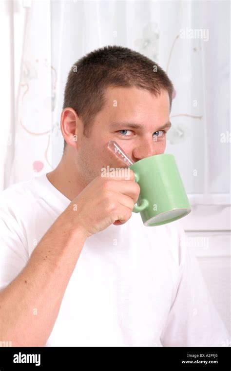 Man Drinking Cup Of Tea Stock Photo Alamy