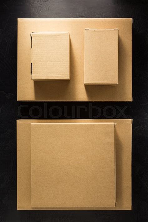 Cardboard Box On Black Background Stock Image Colourbox