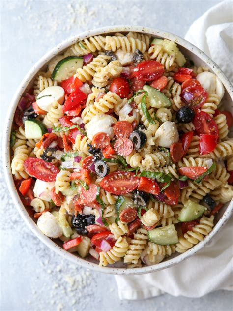 Fresh and easy pasta salad packed with crisp vegetables, fresh mozzarella, and tossed with a simple dressing. Italian Pasta Salad