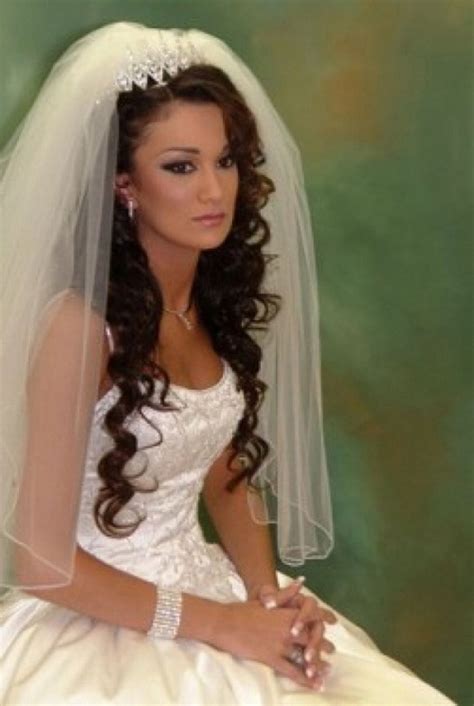 It is perfect if you love braids, but this is a great look for someone who wants to wear a veil for the ceremony and pictures but wants to be able to easily remove it for dinner and dancing, and. 20 Wedding Hairstyles with Tiara Ideas - Wohh Wedding
