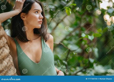 Sensual Young Brunette Lovely Woman In Tropical Jungle Stock Image