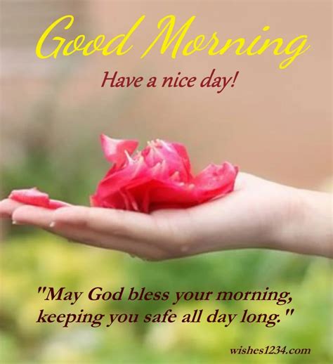 someone holding a flower in their hand saying good morning have a nice day may god bless your