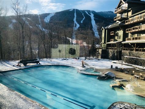 The Lodge At Spruce Peak Stowe Pool2 Theluxuryvacationguide