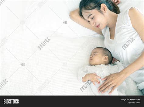 asian mom sleeping telegraph