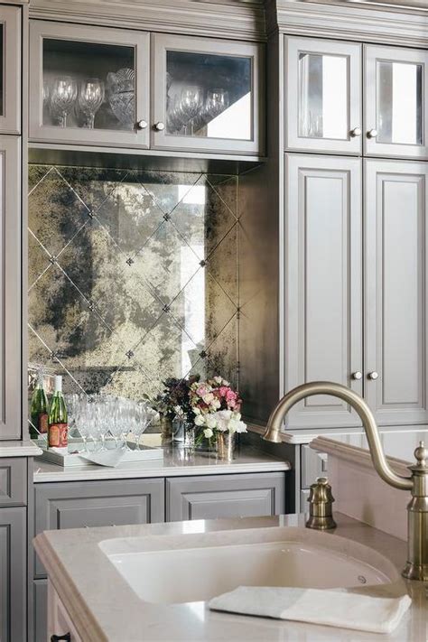 These ceramic tiles will also give your room a more distinct look, with it's subtle light blue and white coloring. Gray Wire Brushed Oak Bar Cabinets with Mirrored Tile ...