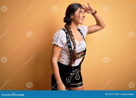 Young Beautiful Brunette German Woman Celebrating Octoberfest Wearing Traditional Dress Very