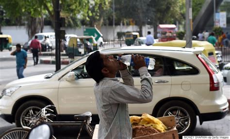 Photos Of Indias Deadly Heat Wave Show People Seeking Respite From The