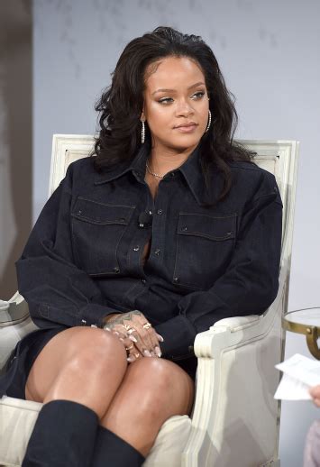 rihanna flaunts her cleavage and legs in head to toe denim photos