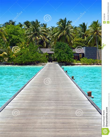 View On Tropical Island From The Wooden Bridge To The Coast Over The