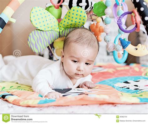 Baby Lying On Developing Rug Stock Photo Image Of Look Childhood