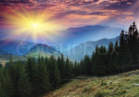 Majestic Sunset In The Mountains Stock Photo Colourbox