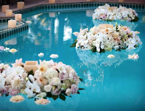 Floating Flowers And Candlelight Tran Pool Wedding Decorations