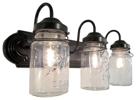 There are cage style vanity lights, black shade vanity lights, and glass bulb vanity light fixtures. Bathroom Mason Jar Triple Vanity Wall Sconce Light ...