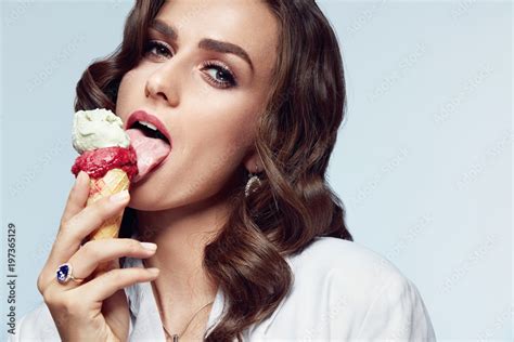 Sexy Woman With Beauty Makeup Eating Ice Cream Stock Photo Adobe Stock