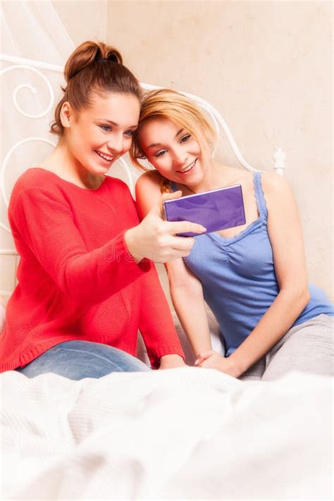 Girls Doing Themselves Photo In A Bedroom Stock Image Image Of