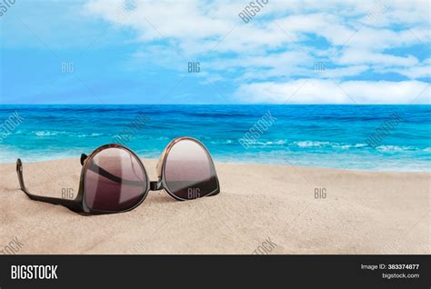 Sunglasses On Seashore Image And Photo Free Trial Bigstock