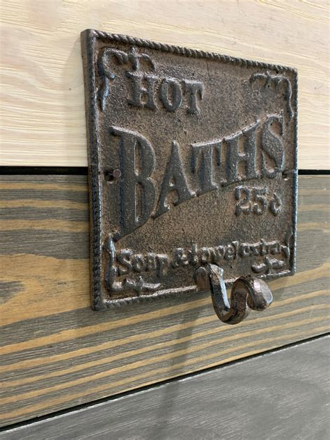 cast iron hot baths 25 cents wall towel hook plaque wall etsy