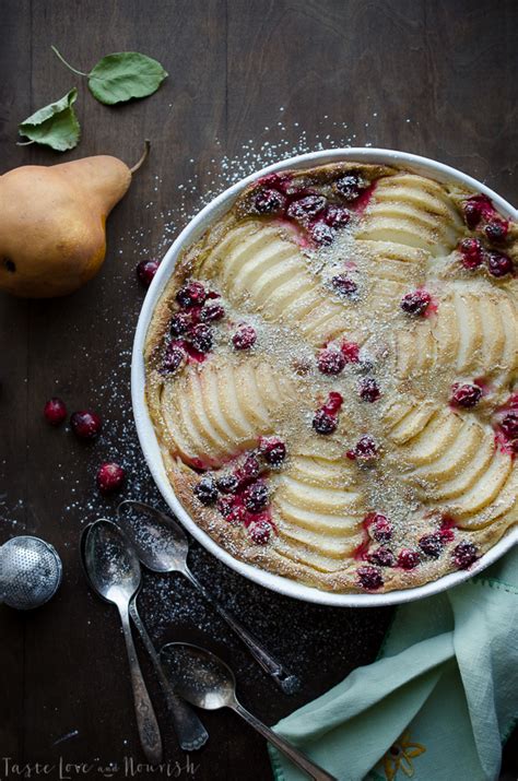 A french dessert made by baking fresh fruit (traditionally cherries) with a batter. Cranberry Pear Clafouti - Taste Love and Nourish