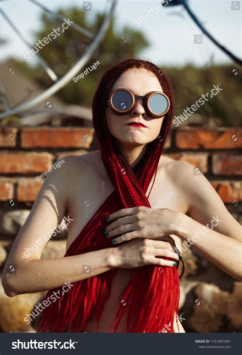 Seminude Glamorous Girl Scarlet Dreadlocks Welding Stock Photo