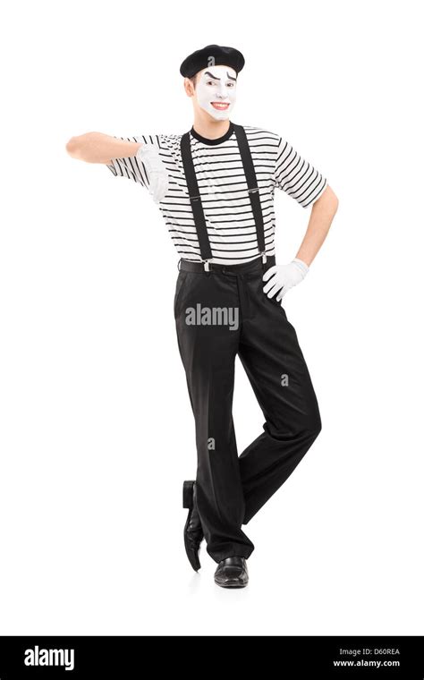 Full Length Portrait Of A Male Mime Artist Posing Isolated Against