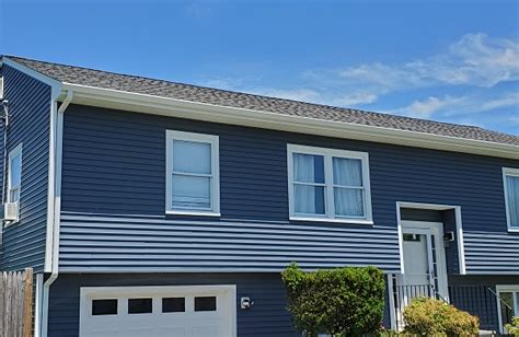 Prepping the wall for vinyl siding installation. CertainTeed Vinyl Siding, GAF Roofing, Dartmouth, MA ...