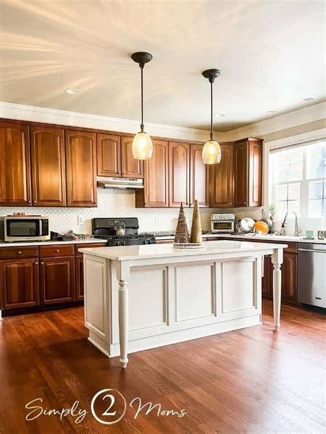 How To Choose A Paint Color To Compliment Cherry Cabinets Cherry Wood Kitchen Cabinets Cherry